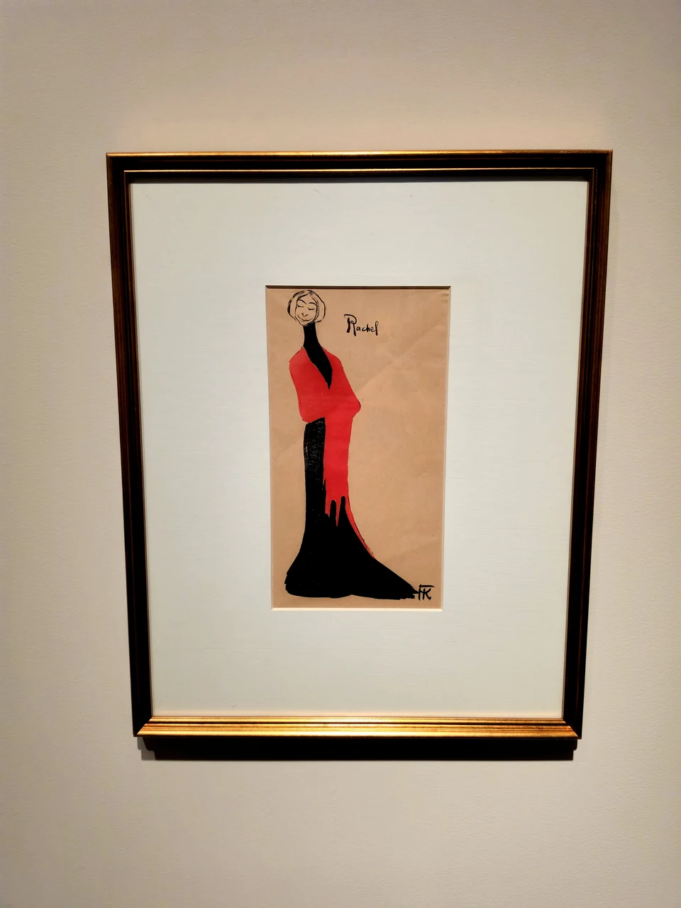 Une estampe représentant une figure en longue robe rouge